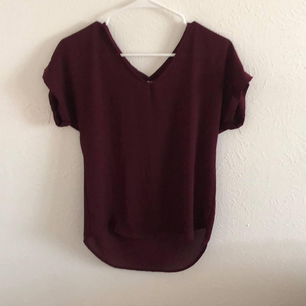 A maroon shirt